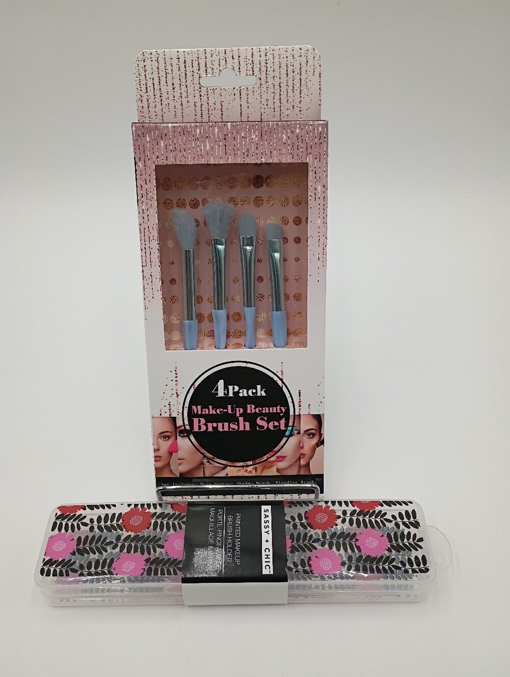 Four piece makeup brush set and makeup brush holder.